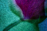 Tulip by Frantisek Strouhal: grainy abstract of magenta, teal and green fields with a soft shadow, the whole impressionistic photograph