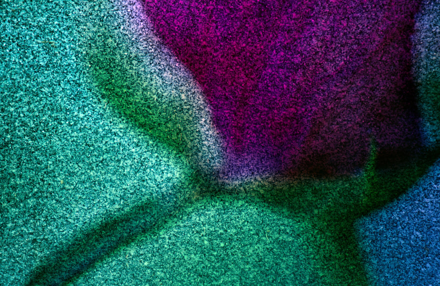 Tulip by Frantisek Strouhal: grainy abstract of magenta, teal and green fields with a soft shadow, the whole impressionistic photograph