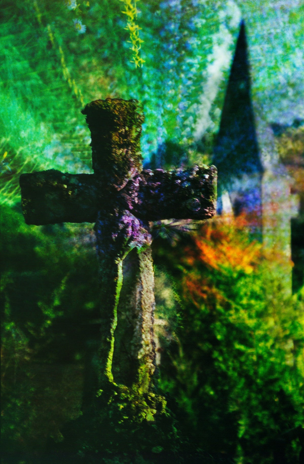 The Cross by Frantisek Strouhal: weathered stone cross with a church spire behind, green and blue washes, the whole impressionistic photograph