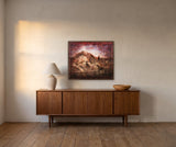 A Joyful Ride by Frantisek Strouhal: two riders on horseback crossing a hill under a deep red sky, the 30 by 24 inch print in a dark oak floater frame, hanging above a walnut sideboard in a calm room, shown at its true size