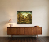 Spellbound in Eden by Frantisek Strouhal: nude figure reclining in a field of bare trees, olive and brown tones, the 30 by 24 inch print in a dark oak floater frame, hanging above a walnut sideboard in a calm room, shown at its true size