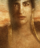 A close view of the middle of the same print, where the separate marks of the inks and the weave of the canvas can be seen.