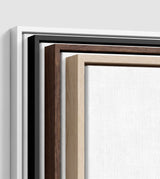 The four frames it comes in, nested one inside another so the wood and the profile of each can be seen: white on the outside, then black, then dark oak, then oak. Each holds a blank canvas, with the shadow gap that runs between the canvas and the wood.