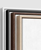 The four frames it comes in, nested one inside another so the wood and the profile of each can be seen: white on the outside, then black, then dark oak, then oak. Each holds a blank canvas, with the shadow gap that runs between the canvas and the wood.