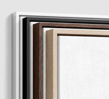The four frames it comes in, nested one inside another so the wood and the profile of each can be seen: white on the outside, then black, then dark oak, then oak. Each holds a blank canvas, with the shadow gap that runs between the canvas and the wood.