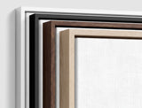 The four frames it comes in, nested one inside another so the wood and the profile of each can be seen: white on the outside, then black, then dark oak, then oak. Each holds a blank canvas, with the shadow gap that runs between the canvas and the wood.