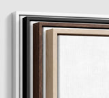 The four frames it comes in, nested one inside another so the wood and the profile of each can be seen: white on the outside, then black, then dark oak, then oak. Each holds a blank canvas, with the shadow gap that runs between the canvas and the wood.