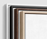 The four frames it comes in, nested one inside another so the wood and the profile of each can be seen: white on the outside, then black, then dark oak, then oak. Each holds a blank canvas, with the shadow gap that runs between the canvas and the wood.