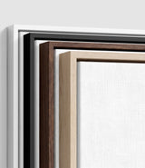 The four frames it comes in, nested one inside another so the wood and the profile of each can be seen: white on the outside, then black, then dark oak, then oak. Each holds a blank canvas, with the shadow gap that runs between the canvas and the wood.