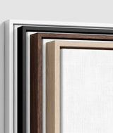 The four frames it comes in, nested one inside another so the wood and the profile of each can be seen: white on the outside, then black, then dark oak, then oak. Each holds a blank canvas, with the shadow gap that runs between the canvas and the wood.